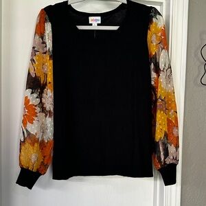 LuLaRoe Penny Black Top with Orange and Yellow Floral Puff Sleeves